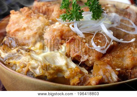 Katsudon Or Japanese Style Fried Pork Roast .