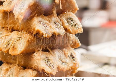Turkish sweets and honey for a showcase closeup.