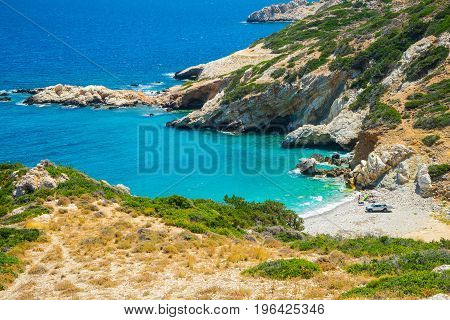 Young people with car on the beach Tholos Crete Greece