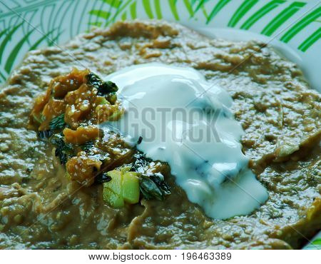 Badenjan Kashk - Persian Pot.  close up meal