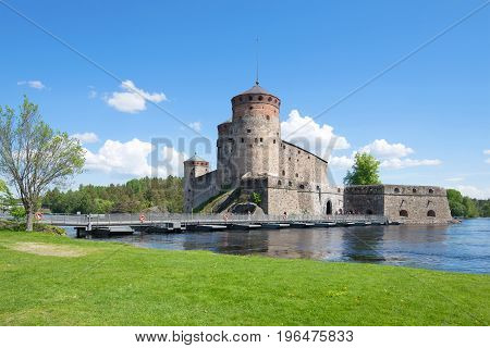 View of old Olavinlinn's fortress in the sunny June afternoon. Finland, Savonlinna