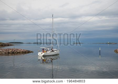 HANCO, FINLAND - JUNE 11 2017: The yacht goes on a voyage from the port of Hanko