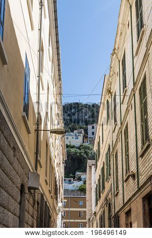 Sky and Rock of Gibraltar Through Alley