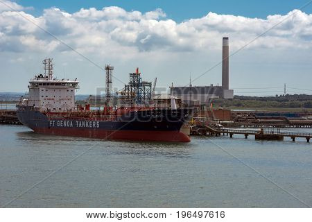 Fawley, UK. 8th July 2017. An oil tanker ship is berthed at the Fawley refinery in Southampton Water. Fawley refinery is the largest of its kind in the UK.
