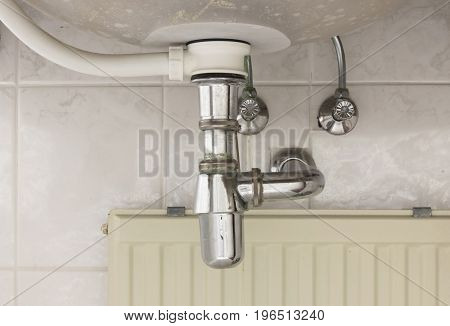 Basin Siphon Or Sink Drain In A Bathroom