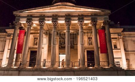 London UK - February 23 2016: The National Gallery in Londonin Trafalgar Square at dusk. The National Gallery houses one of the greatest collections of paintings in the world. Enjoy free entrance 361 days a year.