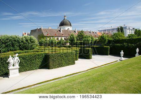 Green Labyrinth In The Garden Of The Belvedere Lower Palace And A View Of The Dome Of The Church. Vi
