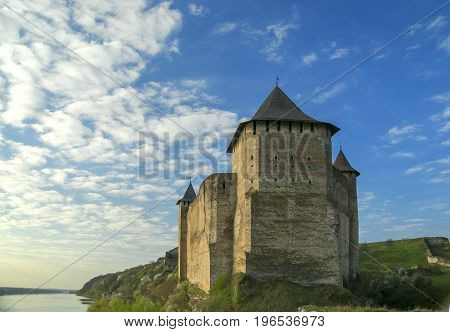 The castle near the river at dawn