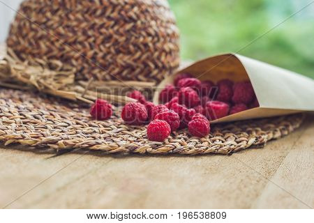 Summer Holiday, Vacation, Relaxation Concept. Raspberries, Straw Hat. Free Text Copy Space. Summer V
