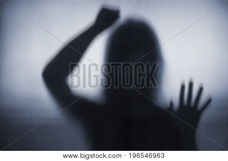 Horror Woman Behind Hitting The Matte Glass In Blurry Hand And Body Figure Abstraction