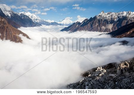 Manaslu valley covered with clouds on Manaslu circuit trek in Nepal