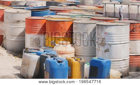 On the closed territory there are barrels with spent oil products