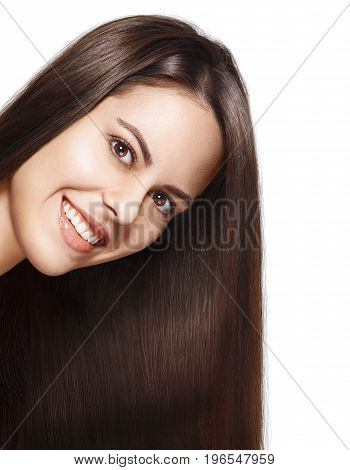 portrait of attractive smiling brunette woman with long hair isolated on white background
