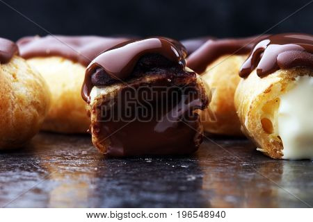 Traditional French Dessert. Eclair With Chocolate Icing. Pastery Concept