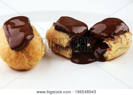 Traditional French Dessert. Eclair With Chocolate Icing. Pastery Concept