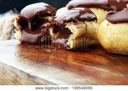 Traditional French Dessert. Eclair With Chocolate Icing. Pastery Concept