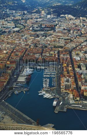 NICE FRANCE - August 16th 2016: Aerial view of the city of Nice France and surrounding coastline while landing at Nice Airport on a serene summer afternoon
