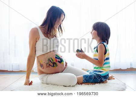 Happy Child, Boy, Painting On Mommy's Pregnant Belly