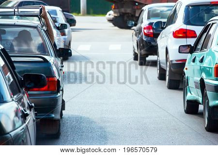 Cars on a city street in traffic jam
