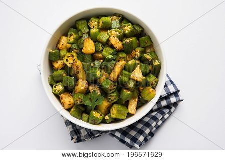 Indian masala fried bhindi or bhendi or Okra or ladyfinger curry or sabji, selective focus
