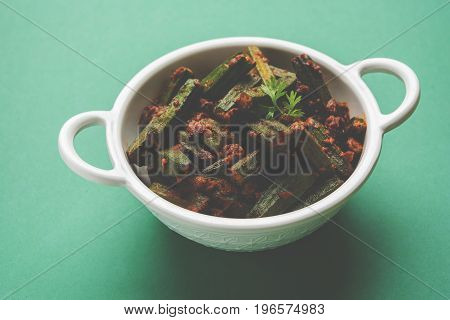Indian masala fried bhindi or bhendi or Okra or ladyfinger curry or sabji, selective focus