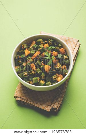 Indian masala fried bhindi or bhendi or Okra or ladyfinger curry or sabji, selective focus