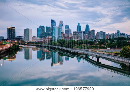 Philadelphia skyline at night with the Schuylkill river