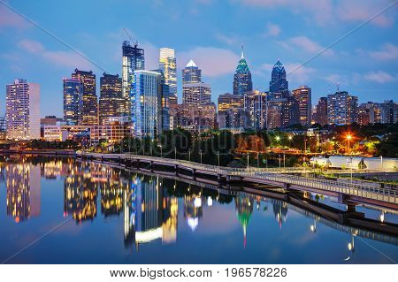 Philadelphia skyline at night with the Schuylkill river