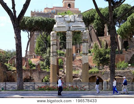 Rome, Italy - May 14, 2012. View from the street on Temple of Castor and Pollux also called Temple of Dioscuri in Roman Forum