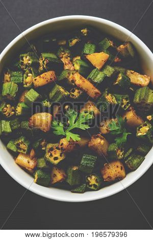 Indian masala fried bhindi or bhendi or Okra or ladyfinger curry or sabji, selective focus