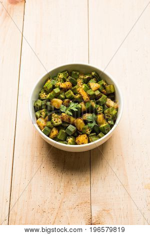 Indian masala fried bhindi or bhendi or Okra or ladyfinger curry or sabji, selective focus