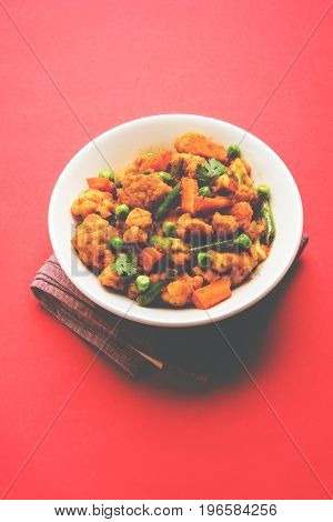 indian spicy food Gobi matar Masala or cauliflower curry with green peas or phool gobi fry, selective focus