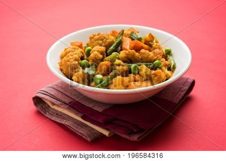 indian spicy food Gobi matar Masala or cauliflower curry with green peas or phool gobi fry, selective focus