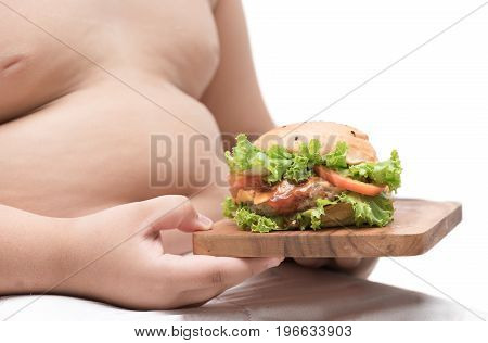 Pork Hamburger On  Wood Plate And Obese Boy Background