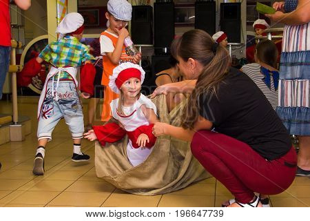 Alchevsk, Ukraine - July 23, 2017: School Cook For Children. Active Games With Children In The Form