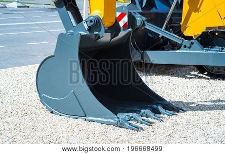 rusty claw of a bulldozer Excavator armup Close With a Back Hoe Close-up of the teeth on a bulldozer scoop. Shallow depth of field.