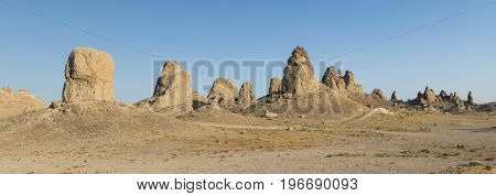 Trona Pinnacles are nearly 500 tufa spires hidden in California Desert National Conservation Area, not far from the Death Valley National Park, California, USA. Panoramic photo