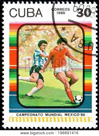 UKRAINE - CIRCA 2017: A postage stamp printed in Cuba shows Football Player's from series FIFA World Cup 1986 - Mexico circa 1986