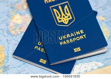 Ukrainian Travel Passport On A World Map