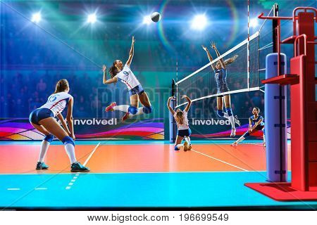 Female professional volleyball players on grand court in hilights