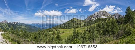 Nassfeld in Carnic Alps with mountain Gartnerkofel and High Tauern with Grossglockner in the background