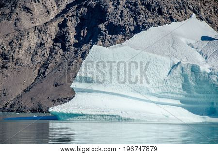 Small icebergs and reflections near the coast Greenland