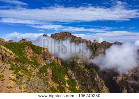Hiking Pico do Arierio and Pico Ruivo - Madeira Portugal - travel background