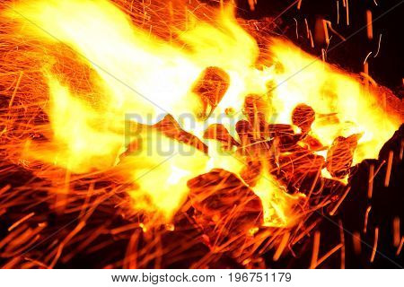 Hot sparking live-coals burning in a barbecue