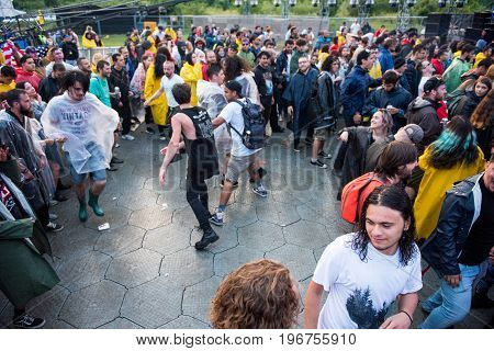 Headbanging Crowd In The First Row At A Hardcore Concert