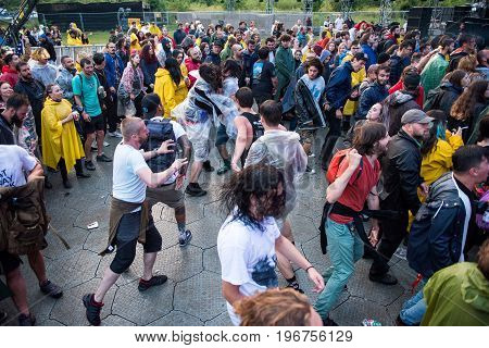 Headbanging Crowd In The First Row At A Hardcore Concert
