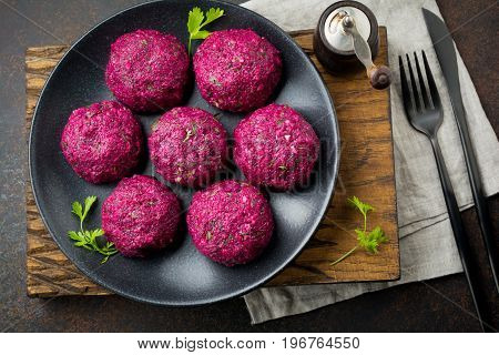 Snack of beet cabbage walnut and cilantro. Traditional Georgian dish Pkhali. Selective focus.Top view. Copy space.