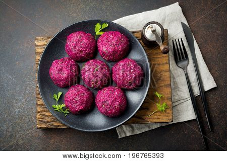 Snack of beet cabbage walnut and cilantro. Traditional Georgian dish Pkhali. Selective focus.Top view. Copy space.