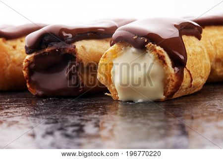 Traditional French Dessert. Eclair With Chocolate Icing. Pastery Concept