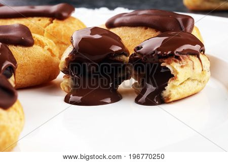 Traditional French Dessert. Eclair With Chocolate Icing. Pastery Concept